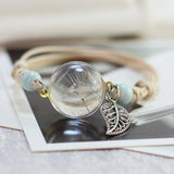 Superbe bracelet Nature et Zen. Une bulle de cristal referment des fleurs naturelles.