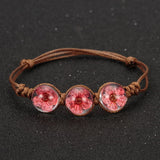 Magnifique Bracelet Nature et Zen, orné de 3 boules en cristal renfermant de véritables fleurs
